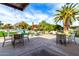 Outdoor community area with tables, chairs, and manicured landscaping at 4800 N 68Th St # 385, Scottsdale, AZ 85251