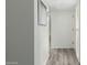 Inviting hallway with fresh paint and modern wood-look floors at 4800 N 68Th St # 385, Scottsdale, AZ 85251