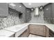 Modern kitchen features sleek cabinetry, stainless steel appliances, and a large farmhouse sink at 4800 N 68Th St # 385, Scottsdale, AZ 85251
