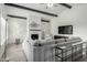Bright living room features vaulted ceilings, white brick fireplace, and large sectional sofa at 4800 N 68Th St # 385, Scottsdale, AZ 85251