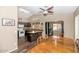 Open kitchen layout with granite countertops, dark cabinetry, and modern appliances at 5002 W Wikieup Ln, Glendale, AZ 85308
