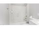 Bathroom featuring a white shower-tub combo, toilet, and sink with marble countertops at 504 E Quentin Ln, San Tan Valley, AZ 85140