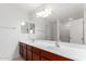 Bathroom features a long vanity with double sinks and ample mirror space at 504 E Quentin Ln, San Tan Valley, AZ 85140
