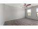 Spacious bedroom featuring neutral paint, carpet, and a ceiling fan at 504 E Quentin Ln, San Tan Valley, AZ 85140