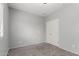 Empty bedroom featuring carpet, neutral paint, and a ceiling light at 504 E Quentin Ln, San Tan Valley, AZ 85140