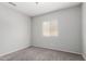 Bedroom with carpet, light grey walls, and a bright window at 504 E Quentin Ln, San Tan Valley, AZ 85140