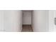 Hallway featuring tile floors and bright, neutral-colored walls at 504 E Quentin Ln, San Tan Valley, AZ 85140
