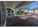 Expansive back patio with a hot tub and a built-in grill, ideal for outdoor living at 6016 W Gambit Trl, Phoenix, AZ 85083