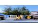 Charming single-Gathering home featuring a landscaped front yard and a two-car garage at 6016 W Gambit Trl, Phoenix, AZ 85083