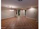 Open concept floor plan with tile floors, recessed lighting, and open sight lines at 6016 W Gambit Trl, Phoenix, AZ 85083