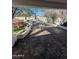 Relaxing patio area with a built-in grill and a hot tub, perfect for entertaining at 6016 W Gambit Trl, Phoenix, AZ 85083