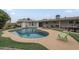 Wonderful backyard features a swimming pool, outdoor furniture, and entertainment space at 6251 E Hannibal St, Mesa, AZ 85205