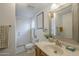 Bathroom featuring a wooden vanity and a decorative plant adding charm at 6251 E Hannibal St, Mesa, AZ 85205