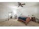 Neutral bedroom featuring carpet flooring, ceiling fan, and lots of closet space at 6251 E Hannibal St, Mesa, AZ 85205