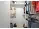 Walk-in closet with built-in shelving, providing organized storage space at 6251 E Hannibal St, Mesa, AZ 85205