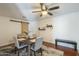 Elegant dining area with modern furnishings, decorative shelves, and stylish barn door at 6251 E Hannibal St, Mesa, AZ 85205