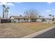 Charming single story home with mature trees and well-manicured front yard at 6251 E Hannibal St, Mesa, AZ 85205