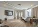 Spacious living room with hardwood floors, recessed lighting, and white trim at 6251 E Hannibal St, Mesa, AZ 85205