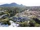 Expansive aerial view of a luxury property with manicured landscaping and stunning mountain views at 6500 E Cactus Wren Rd, Paradise Valley, AZ 85253