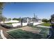 A well-maintained backyard with a modern basketball court and pristine landscaping at 6500 E Cactus Wren Rd, Paradise Valley, AZ 85253