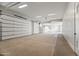 Spacious four-car garage with ample room for vehicles and storage at 6500 E Cactus Wren Rd, Paradise Valley, AZ 85253