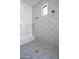 Spacious walk-in shower featuring dual shower heads, bench, and patterned tile at 6500 E Cactus Wren Rd, Paradise Valley, AZ 85253