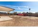 Large backyard includes a covered patio and plenty of room for outdoor enjoyment at 6817 W Palm Ln, Phoenix, AZ 85035