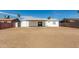 Spacious backyard with room for a pool and entertaining, surrounded by privacy fencing at 6817 W Palm Ln, Phoenix, AZ 85035