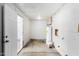 Unfinished basement area is ready for customization and features a water heater at 6817 W Palm Ln, Phoenix, AZ 85035