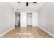 Bedroom features tile floors and closet at 6817 W Palm Ln, Phoenix, AZ 85035