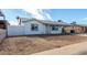 Attractive one-story home featuring a convenient carport and simple landscaping at 6817 W Palm Ln, Phoenix, AZ 85035
