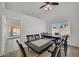 Well-lit dining room with views of the outdoor pool and patio area at 7102 W Julie Dr, Glendale, AZ 85308