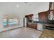 Bright eat-in kitchen featuring stainless steel appliances and tile flooring at 7102 W Julie Dr, Glendale, AZ 85308