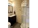 Bathroom with granite countertop vanity, beautiful decorative-tile and a glass shower at 7121 E Mcdonald Dr, Paradise Valley, AZ 85253