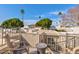 Comfortable outdoor lounge area on a patio with seating offering scenic views of the surrounding area at 7121 E Mcdonald Dr, Paradise Valley, AZ 85253