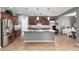 Beautiful kitchen with granite countertops, stainless steel appliances, and ample cabinet space at 714 W Desert Hills Dr, San Tan Valley, AZ 85143