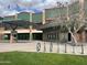 Entrance to stadium with grass lawn and bike rack at 7751 E Glenrosa Ave # A1, Scottsdale, AZ 85251