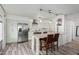 Modern kitchen with stainless steel appliances and a beautiful quartz countertop island at 7751 E Glenrosa Ave # A1, Scottsdale, AZ 85251