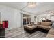 Comfortable seating in a cozy living space with tile floors and modern lighting at 7751 E Glenrosa Ave # A1, Scottsdale, AZ 85251