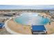 Aerial view of a lake with walking paths and picnic spots at 8335 W Berridge Ln, Glendale, AZ 85305