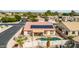 Private backyard oasis with a refreshing pool, covered patio, and low-maintenance landscaping at 8335 W Berridge Ln, Glendale, AZ 85305