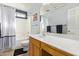 This bathroom is spacious and features a large vanity and combination shower-tub at 8335 W Berridge Ln, Glendale, AZ 85305