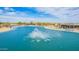 Aerial view of a lake with water fountain at 8335 W Berridge Ln, Glendale, AZ 85305