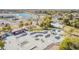 Aerial view showcasing the skate park and splashpad near a lake at 8335 W Berridge Ln, Glendale, AZ 85305
