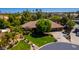 Aerial view of a well-maintained home with mature landscaping and a circular driveway at 8649 S Willow Dr, Tempe, AZ 85284