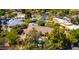 Aerial view of a house showing a backyard pool, patio, and mature trees at 8649 S Willow Dr, Tempe, AZ 85284