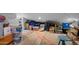 Finished attic space provides versatile storage with some items stored and exposed wood floor at 8649 S Willow Dr, Tempe, AZ 85284