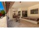 This covered patio area is perfect for outdoor dining and relaxing by the pool at 8649 S Willow Dr, Tempe, AZ 85284