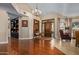 Elegant foyer with hardwood floors, chandelier, arched entryways and stylish decor at 8649 S Willow Dr, Tempe, AZ 85284