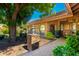 Welcoming brick pathway leading to an arched, ornate front door and landscaped entry at 8649 S Willow Dr, Tempe, AZ 85284